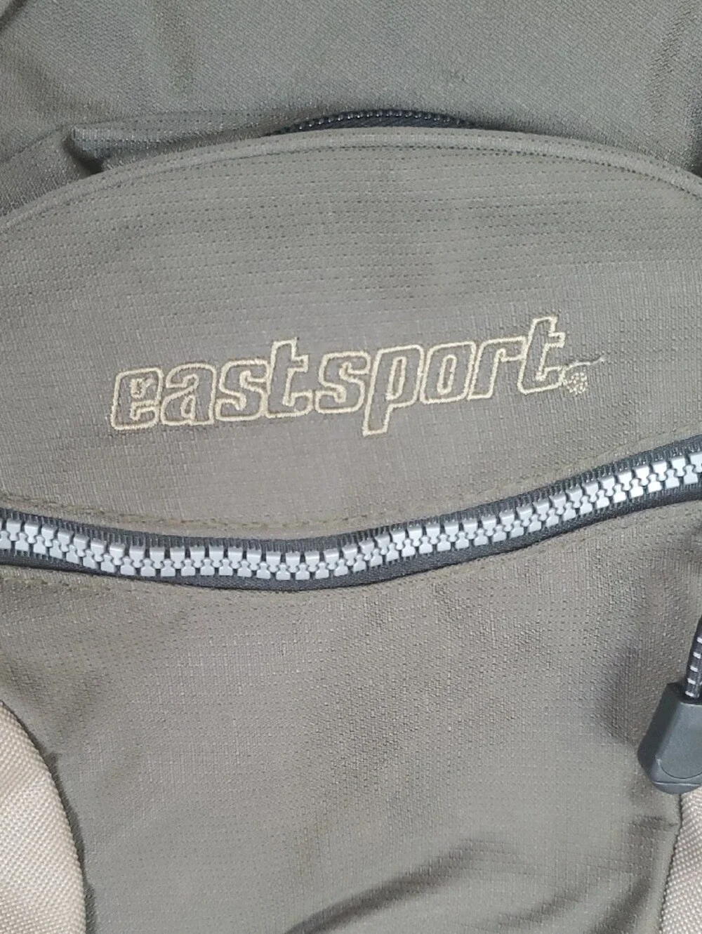 Eastsport Olive and Tan Sling Backpack. Multiple Pockets